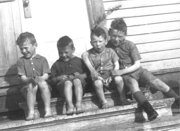 397: Laura (Reddy) Delurey's sons, l-r Joe, Dave, Harold and Jim, at Riverhead, St. Mary's. (circa 1943)  - Laura daughter of James Reddy &amp;amp; Mary Anne Murphy, married Joseph Delurey
